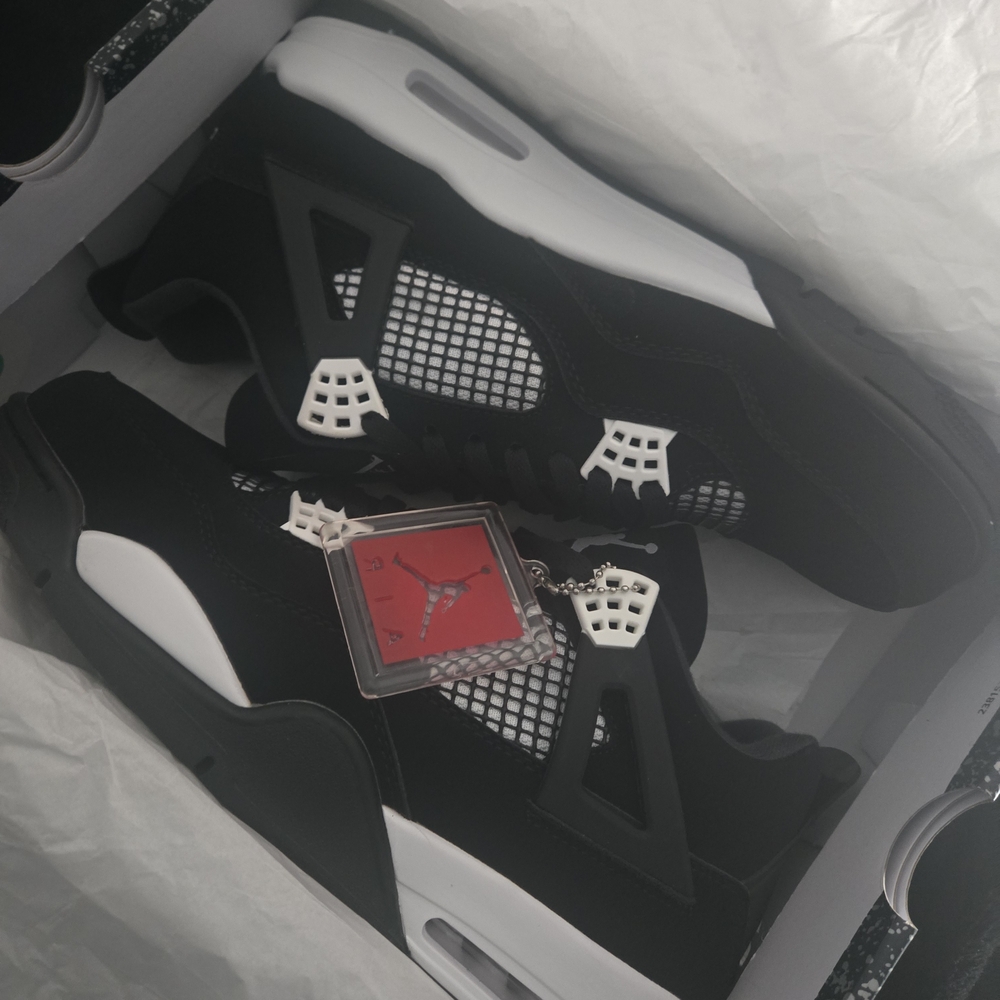 Jordan Black and White Sneakers with Red Accent
